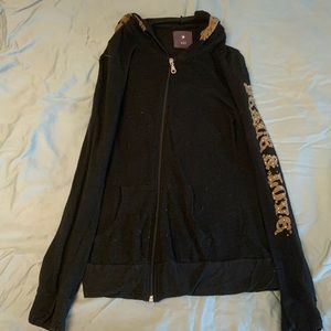 Black light zip up sweater
